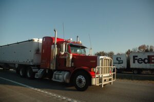 Infrastructure Bill Provision Might Let Young Drivers Fix Employment Shortages in Trucking Industry