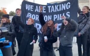 Protesters Claim to Take Abortion Pills During Stunt Outside Supreme Court (VIDEO)
