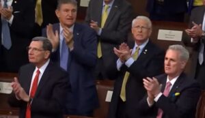 Sen. Joe Manchin Sits on Republican Side During State of the Union