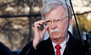 Reporter Detained After Asking John Bolton About Covering Up War Crimes, WMDs, Julian Assange