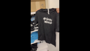 Elon Musk Shares Video Of #StayWoke Shirt In Twitter HQ, Link To DOJ Report On Michael Brown