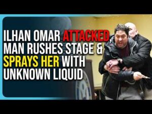 Ilhan Omar ATTACKED, Man Rushes Stage &amp; Sprays Her With Unknown Liquid